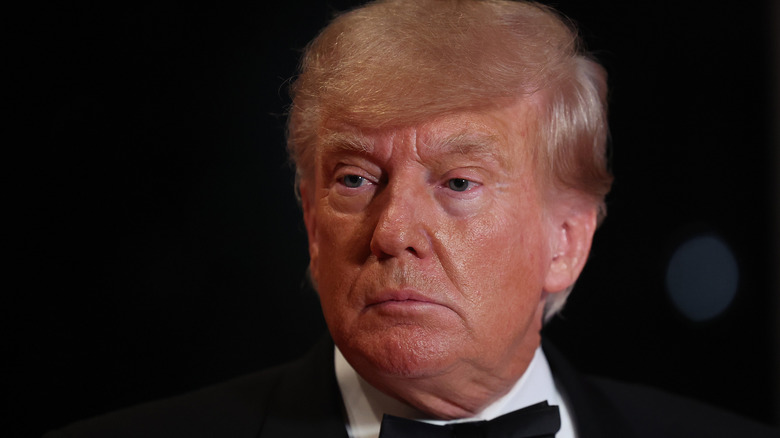 Donald Trump listening at event