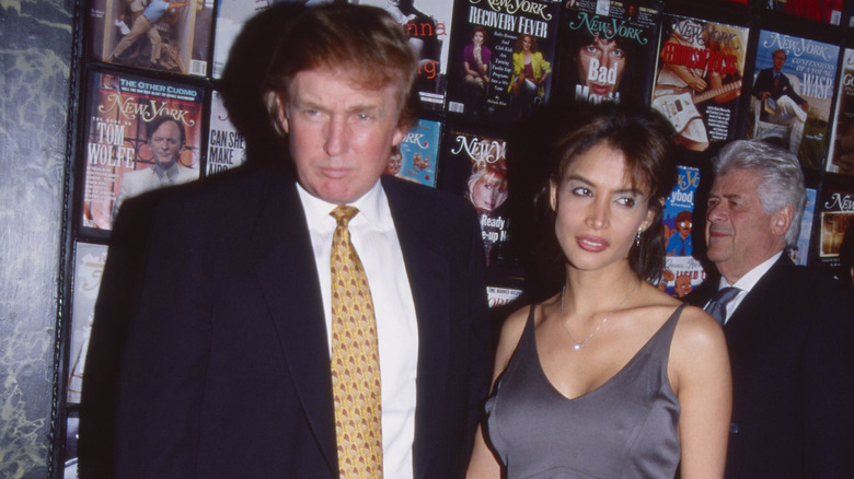 Donald Trump posing with Kara Young