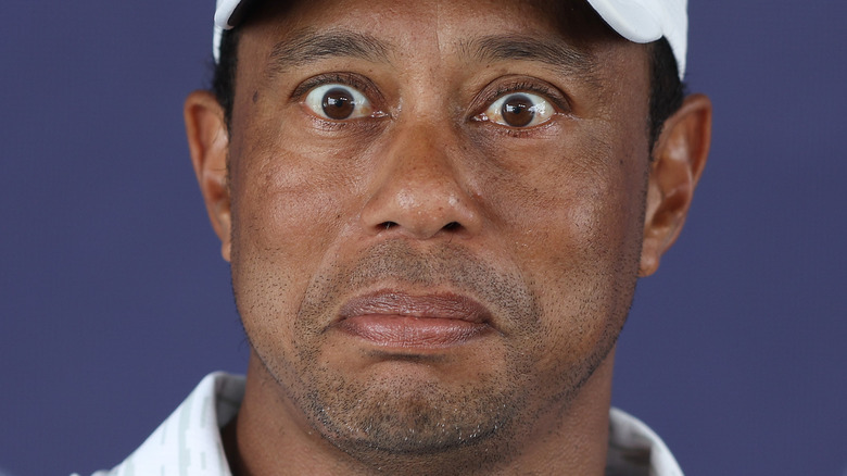 Tiger Woods looking concerned 