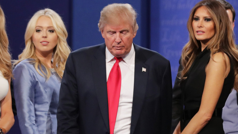 Tiffany and Melania flanking Donald Trump