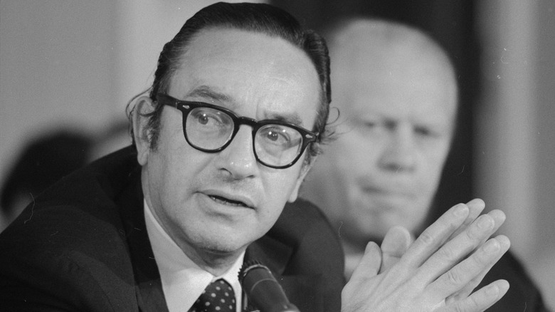 Alan Greenspan talking next to Gerald Ford