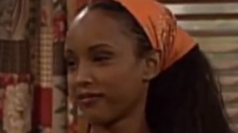 "'Boy Meets World" screen grab, Trina McGee as Angela, wearing a green tank top and bandana