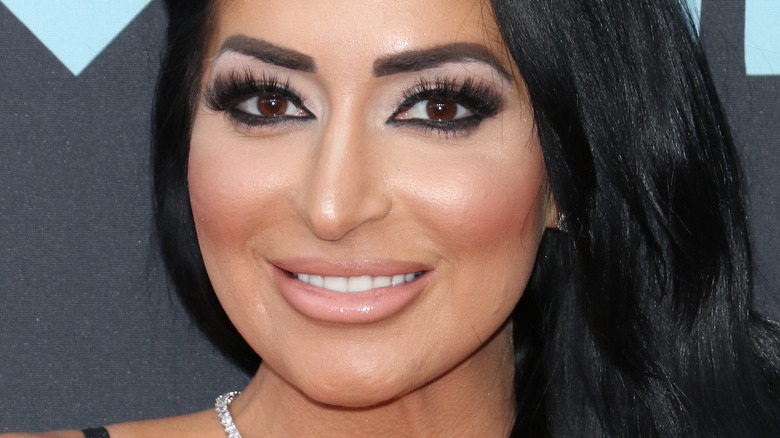 Angelina Pivarnick of Jersey Shore smiling at the camera