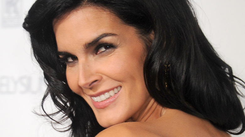 Angie Harmon smiling