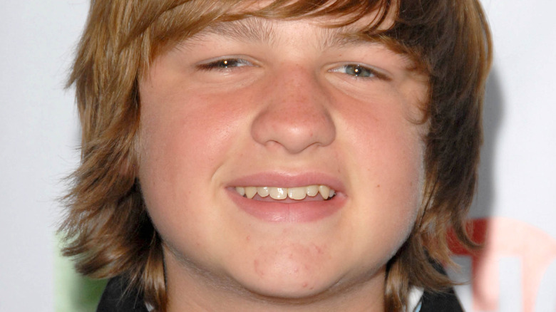 Angus T. Jones smiling