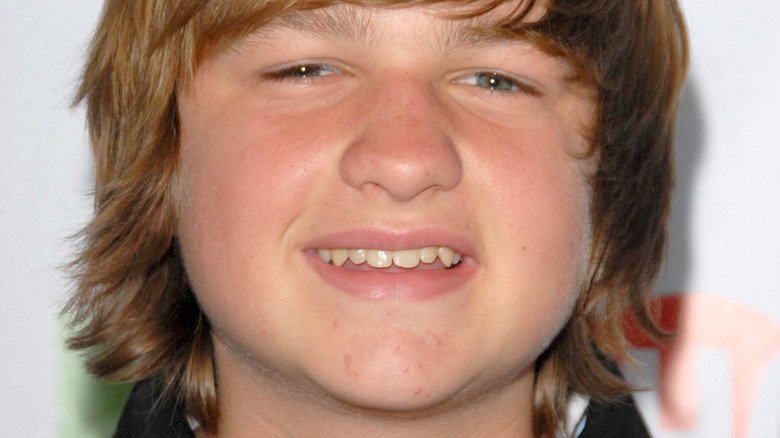 Angus T. Jones smiling