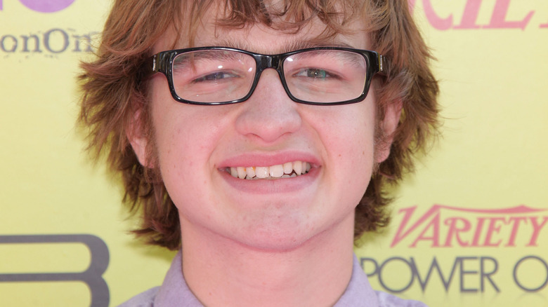 Angus T. Jones smiling