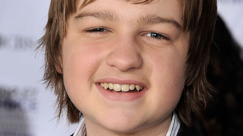 Angus T. Jones smiling