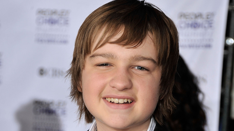 Angus T. Jones smiling
