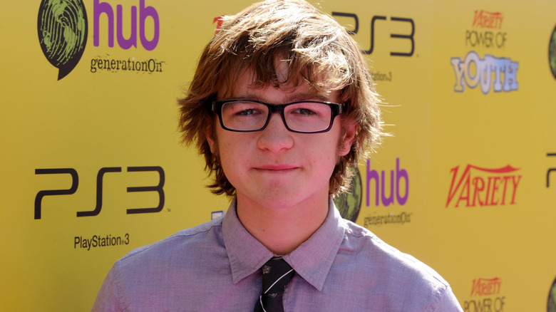 Angus T. Jones smiling