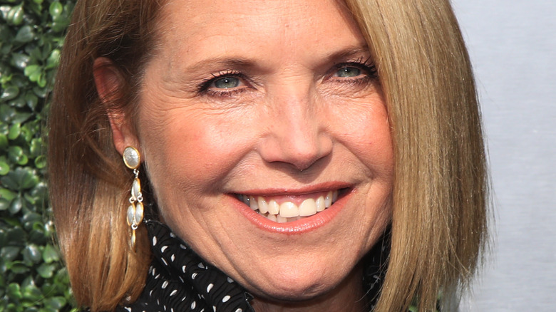 Katie Couric smiling at an event