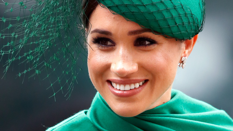 Meghan Markle smiles