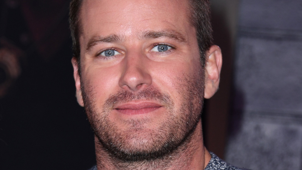 Armie Hammer smiling at an event