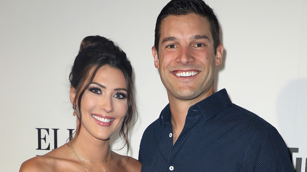 Becca Kufrin and Garrett Yrigoyen smiling