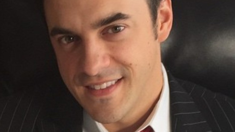 Dan Gheesling smiling in suit