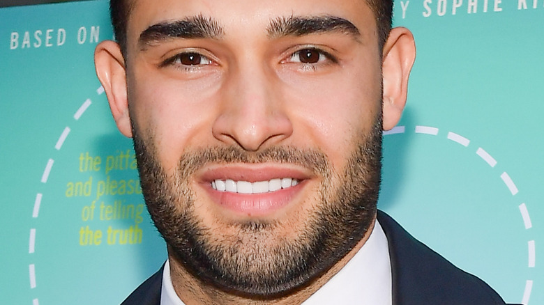 Sam Asghari smiling
