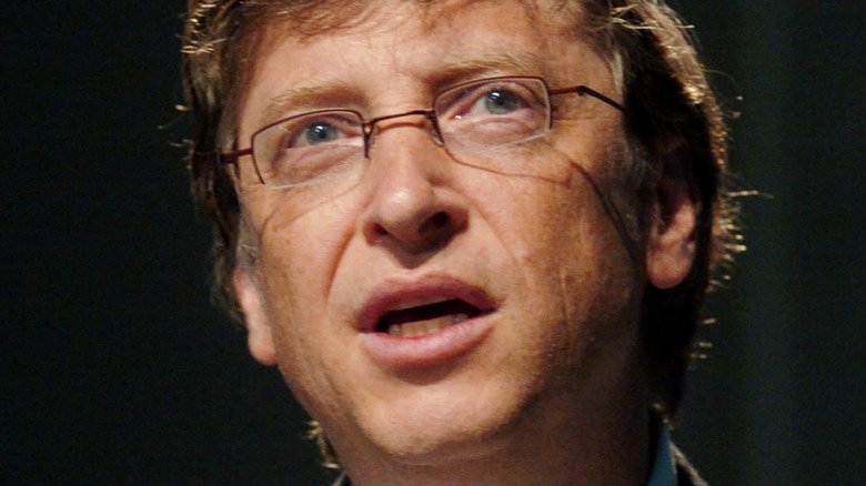 Bill Gates with a neutral expression