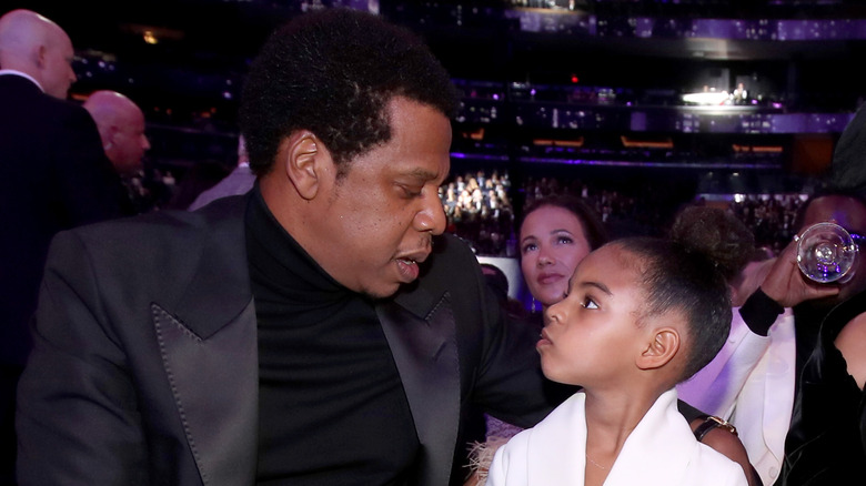 Jay-Z and Blue Ivy sitting together