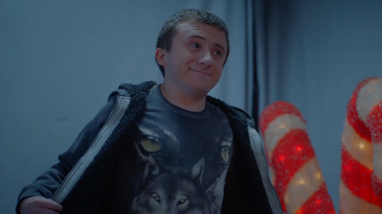 Atticus Shaffer as Archie in I'll Be Next Door for Christmas