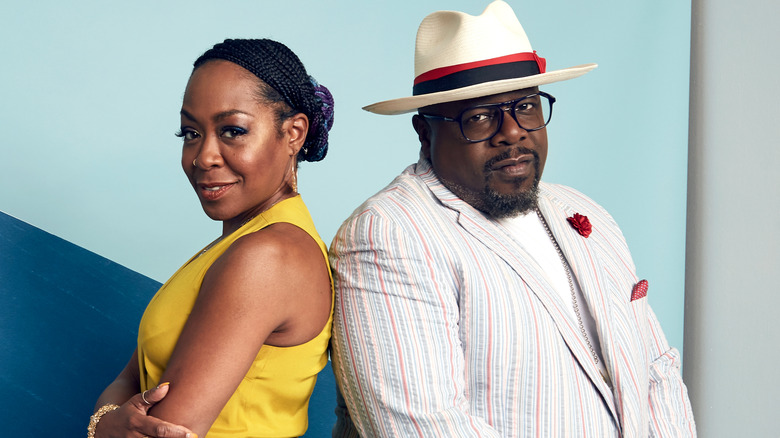 Tichina Arnold and Cedric the Entertainer smiling