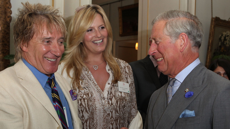 Rod Stewart and his wife laugh with Prince Charles