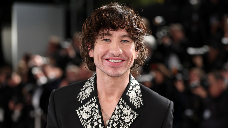 Barry Keoghan posing on the red carpet.