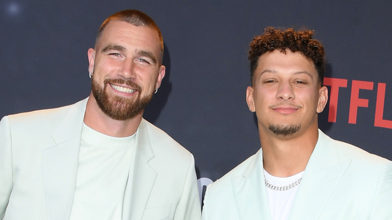Travis Kelce and Patrick Mahomes posing