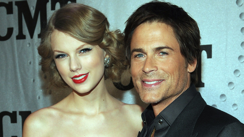 Taylor Swift and Rob Lowe posing