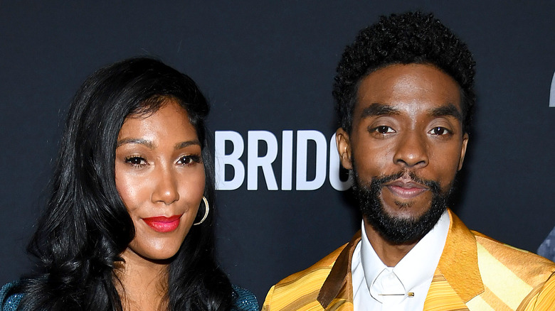 Taylor Simone Ledford and Chadwick Boseman on the red carpet.