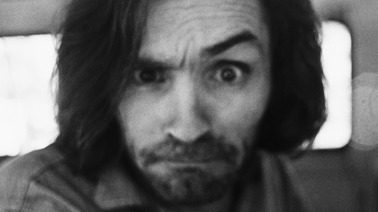 Charles Manson eyebrow raised