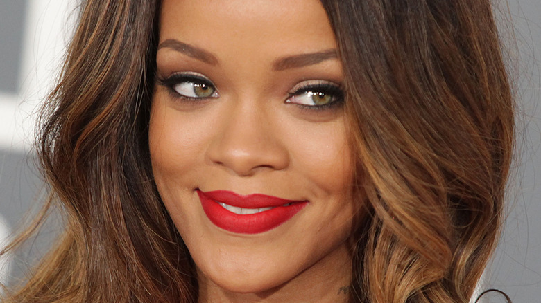 Rihanna smiling on the red carpet