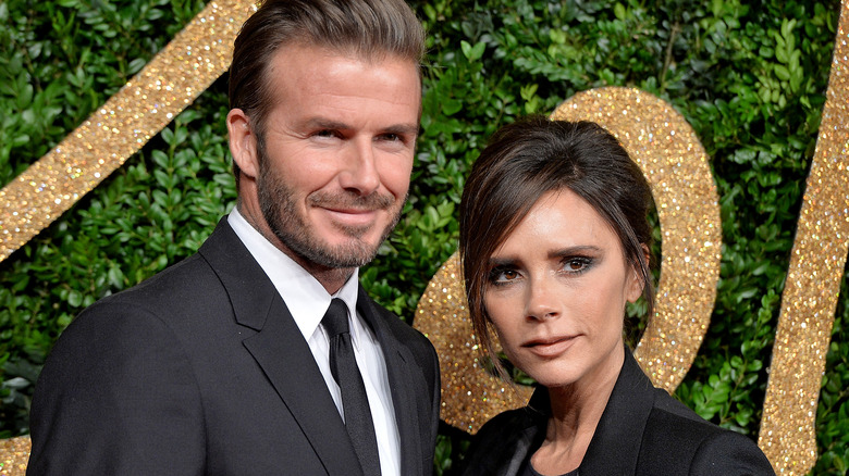 David and Victoria Beckham posing