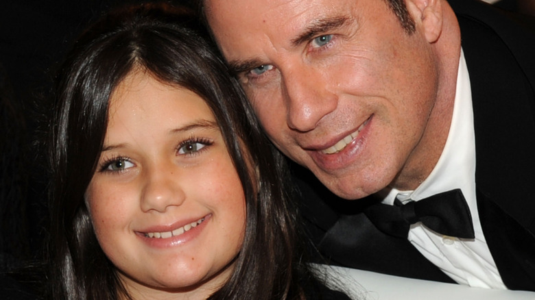 Ella and John Travolta pose for a photo 