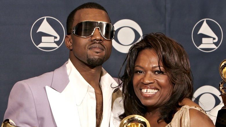 Kanye West poses with his mother Donda