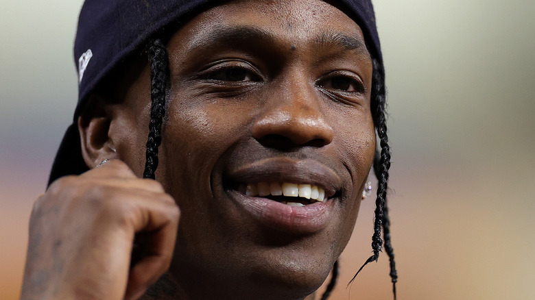 Travis Scott smiling