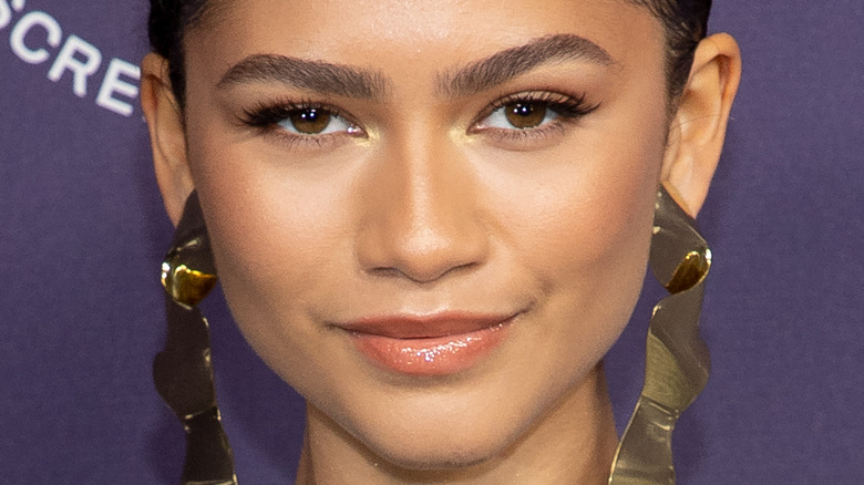 Zendaya posing for photos