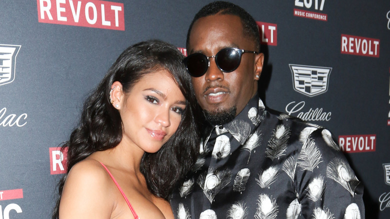 Cassie and Diddy on the red carpet at a Revolt event
