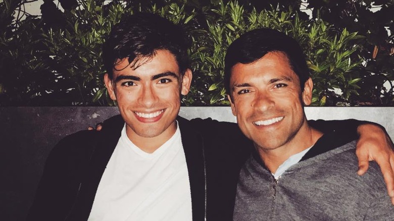 Mark Consuelos poses for a photo with his son