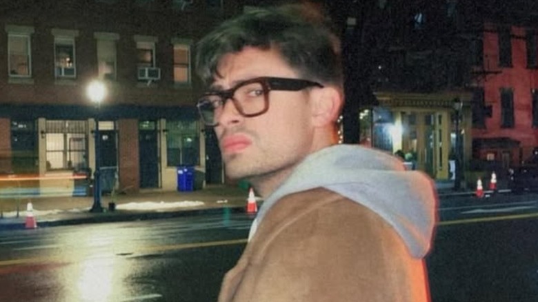 Michael Consuelos wearing glasses