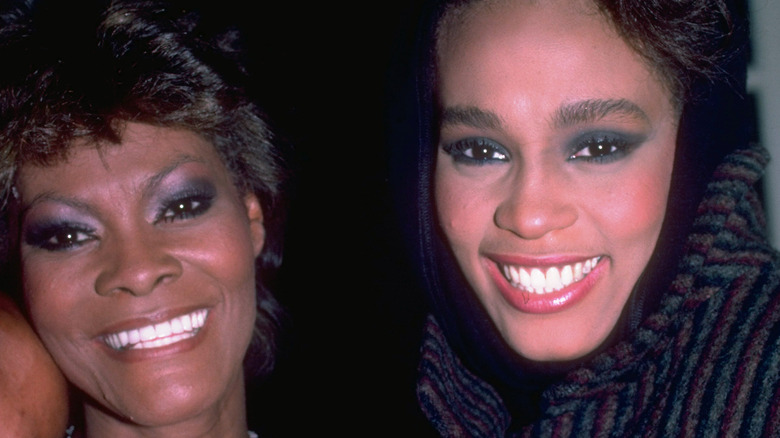 Dionne Warwick and Whitney Houston smiling