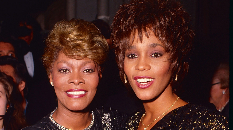 Dionne Warwick and Whitney Houston posing together