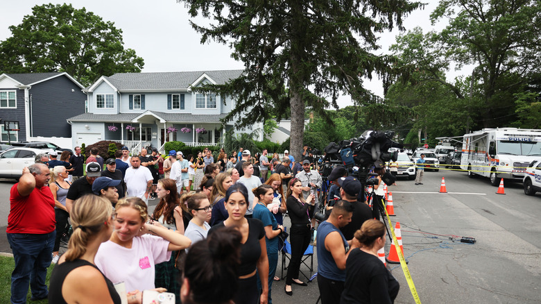 Crowd gathers outside Heuermann's home