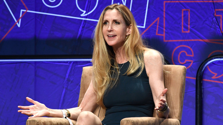 Ann Coulter seated and speaking at an event