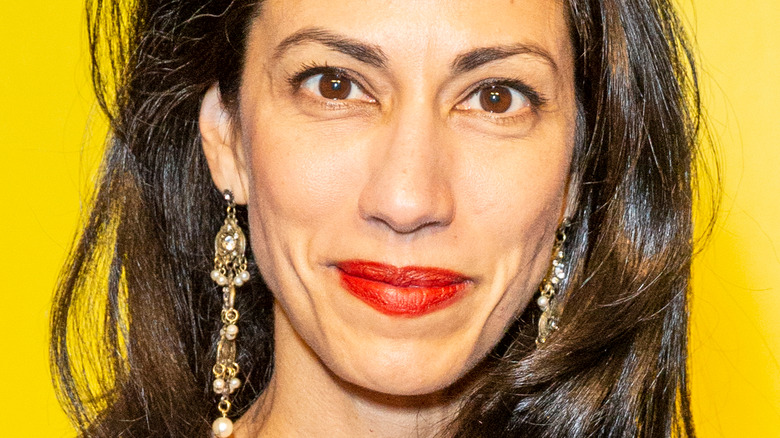 Huma Abedin posing at a 2019 party