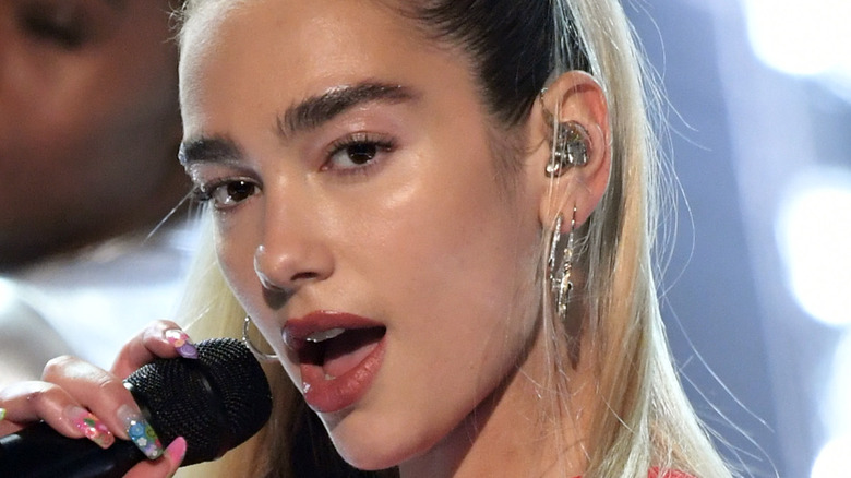 Dua Lipa performing on stage