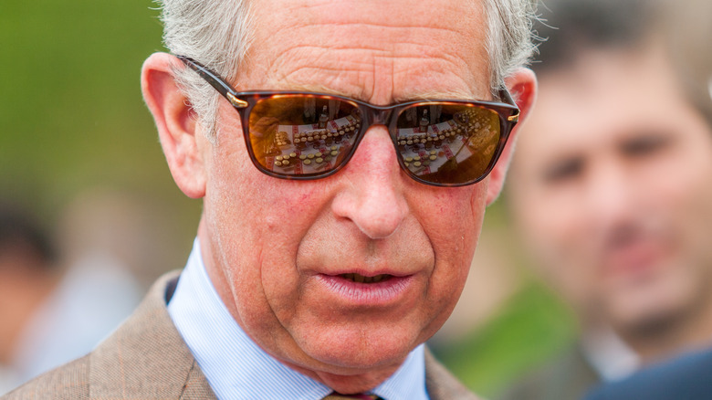 Prince Charles wearing sunglasses