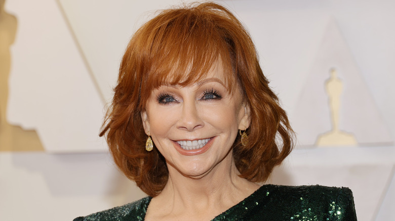 Reba McEntire smiling in close-up