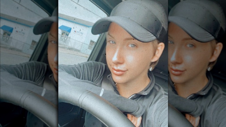Savannah Chrisley smiling and wearing baseball cap
