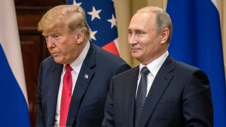 Donald Trump and Vladimir Putin posing