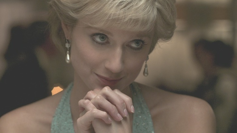 Elizabeth Debicki smiling as Princess Diana